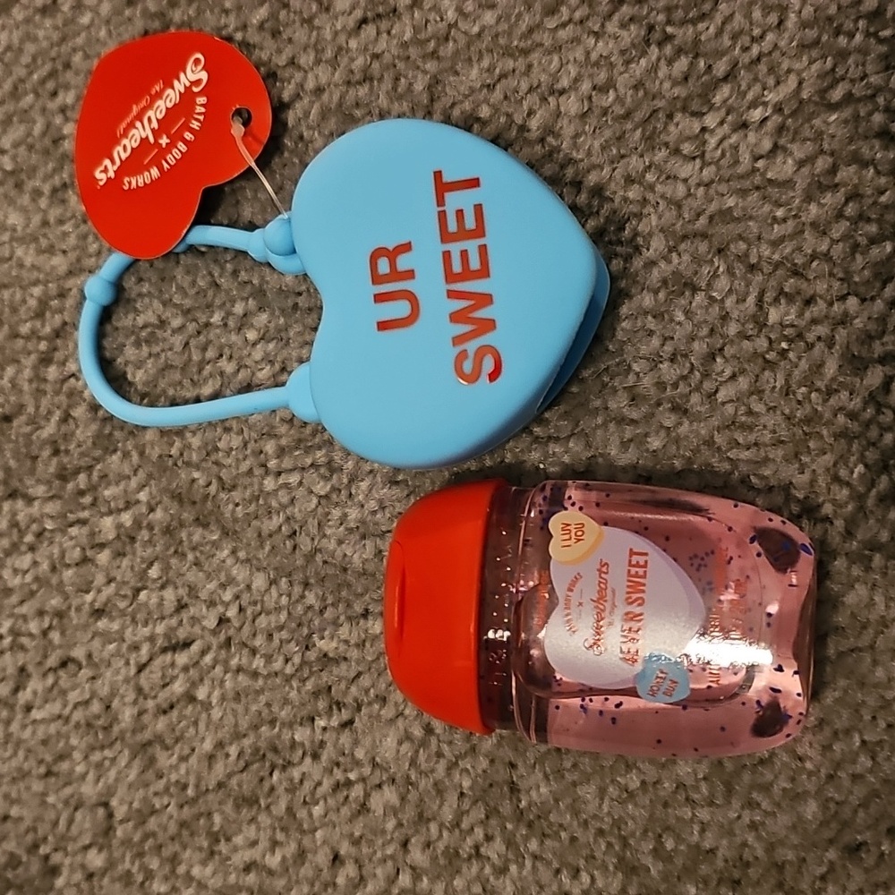 Bath and Body Works hand sanitizer and holder.